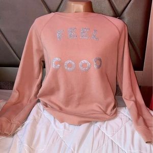 A crew neck old navy pink sweatshirt.